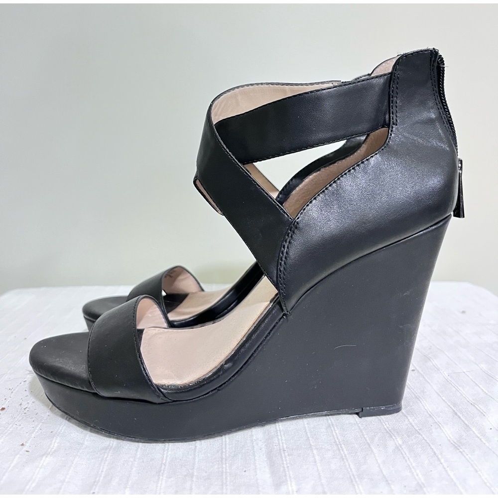 Jessica Simpson wedged sandals.